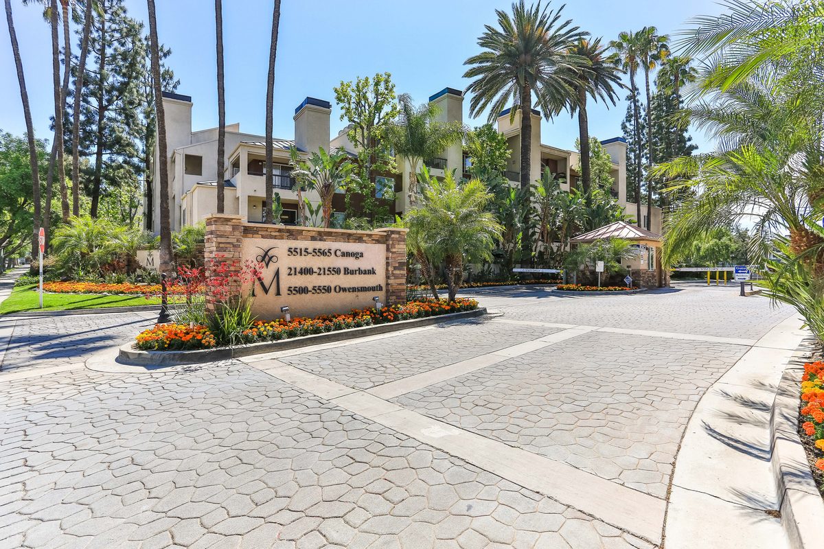 The Met Warner Center entrance and sign — Woodland Hills, CA condos for sale