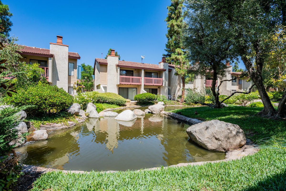 Warner Woodlands Two townhome exterior with balcony — Woodland Hills